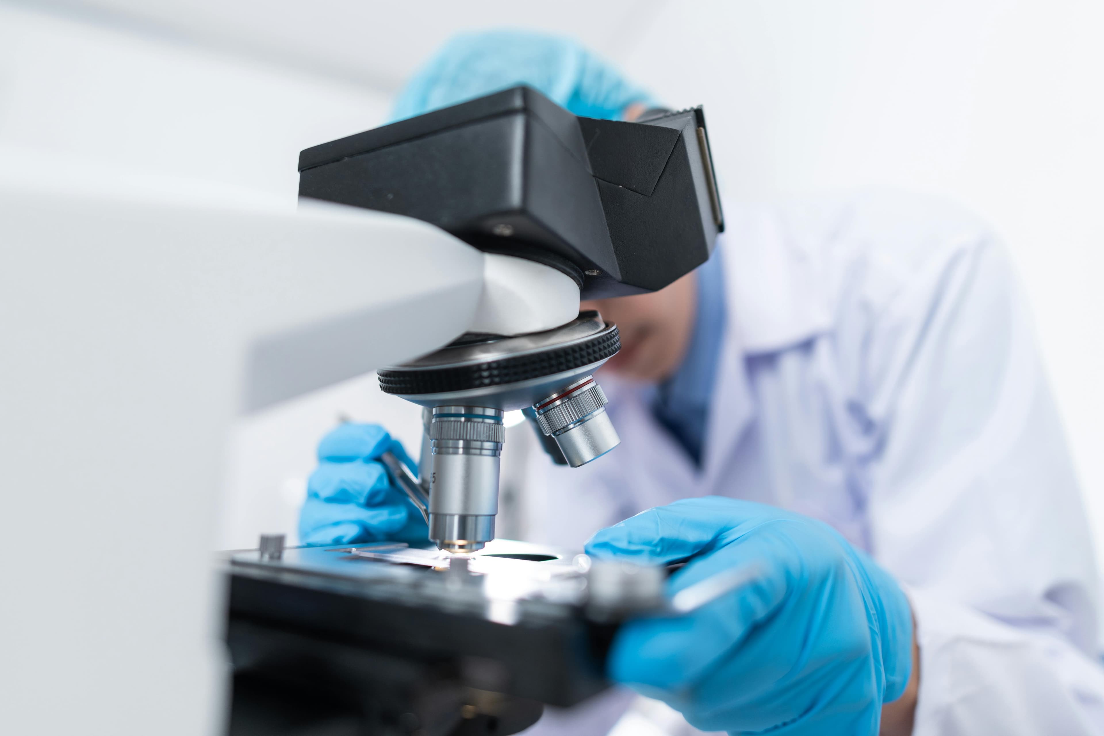 Healthcare worker examining medical data